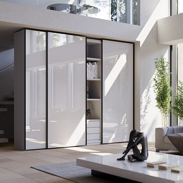 Sliding system for wardrobes with overlapping doors