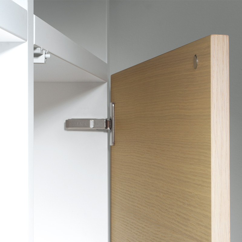 Push opening for handle-less doors